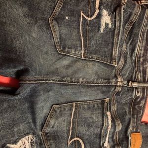 Dark wash ripped skinny jeans